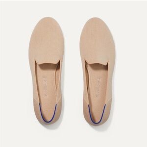 Rothy's Nude Knit Slip-On Flats with Royal Blue Heel Accent